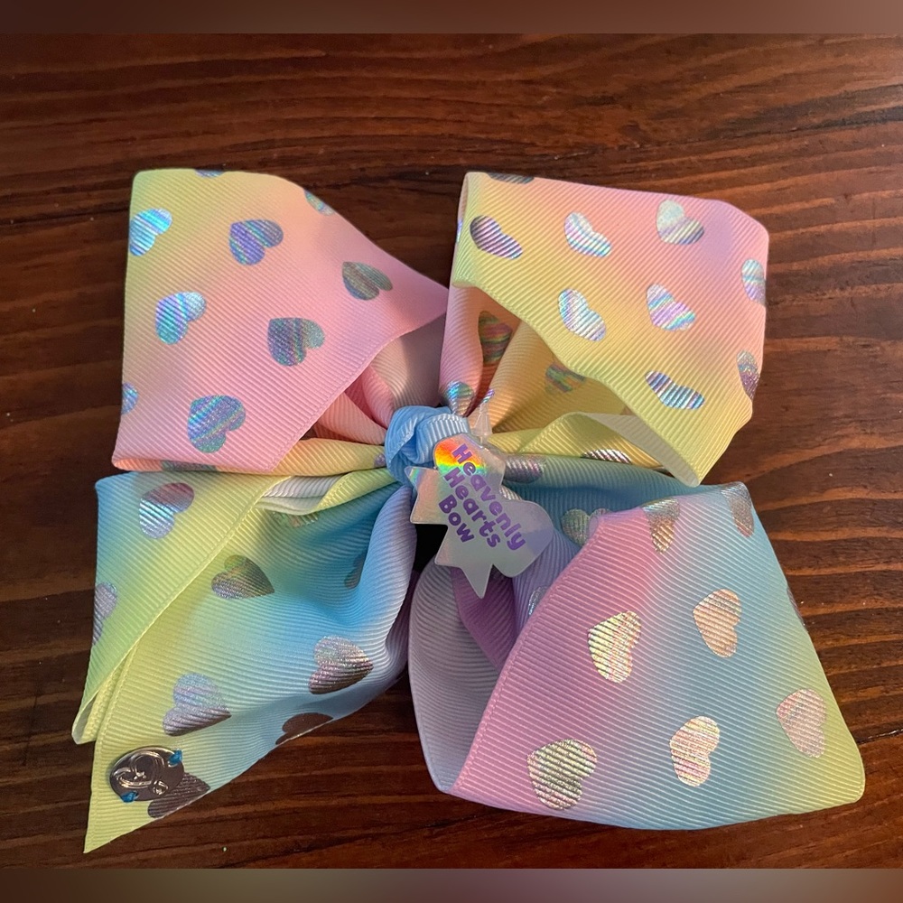 Jojo Siwa signature collection Heavenly Hearts Bow hair clip.
